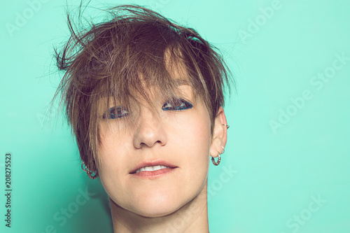 Portrait Of A Girl With Short Hair In Turmoil Vintage Style Photo