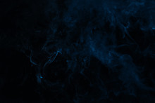 Abstract Dark Smoky Texture With Blue Swirl