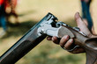 © yuriy - discharged shotgun bent male hand fingers gunpowder