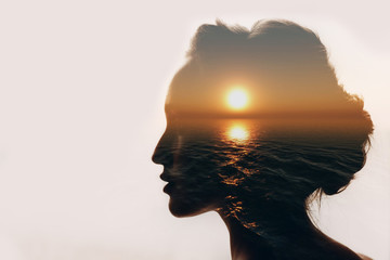 psychology concept. sunrise and woman silhouette.