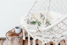 Summer Hygge Concept With Hammock Chair In The Garden