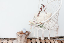 Summer Hygge Concept With Hammock Chair In The Garden