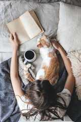 Poster - Hygge concept with cat, book and coffee in the bed