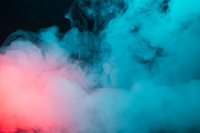 Colorful Smoke On A Black Background Closeup
