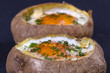 Baked potatoes stuffed with cheese and egg