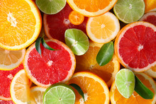 Slices Of Fresh Citrus Fruits As Background