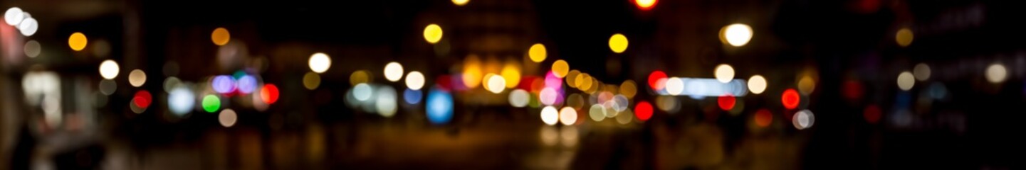 Aufkleber - Bokeh traffic light at night in the street of a big city