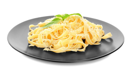 Plate of delicious pasta with cheese on white background