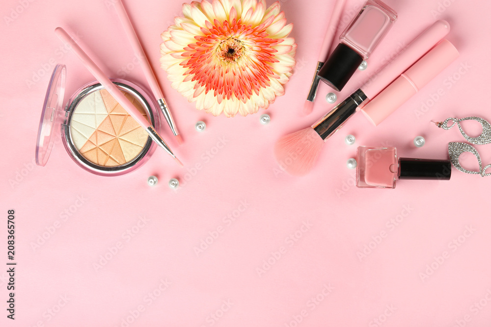 Flat lay composition with decorative cosmetics on color background