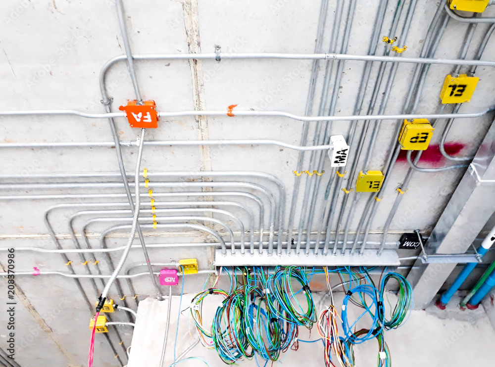 electric lines power and label on the wall ement of construction house ...