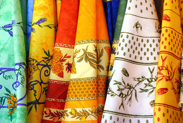 Colorful tablecloth with traditional Provencal fabrics with olive branches