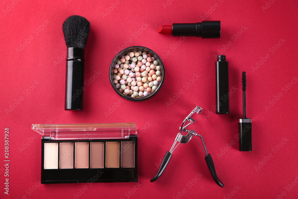 Flat lay composition with cosmetic products on color background