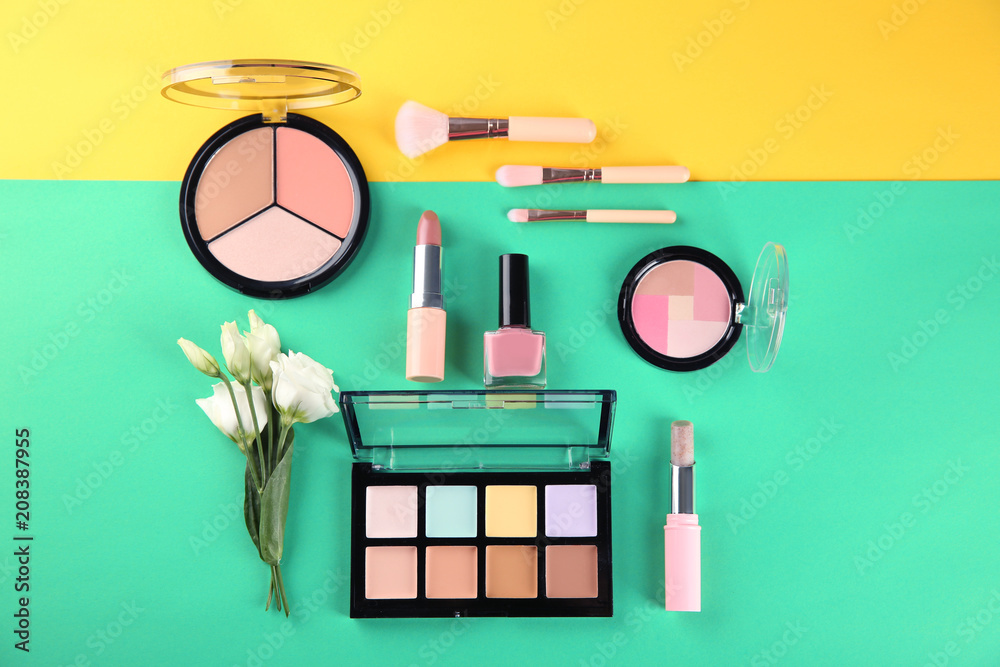 Flat lay composition with cosmetic products on color background