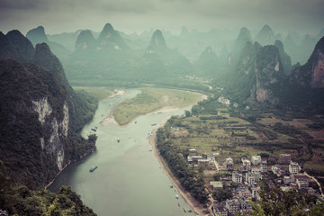 Landscape of Guilin, Li River and Karst mountains. Located near The Ancient Town of Xingping, Yangshuo, Guilin, Guangxi, China.