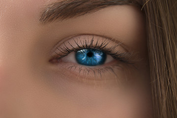 bright blue eyes with long eyelashes close-up