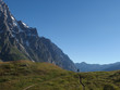 Alpy, Włochy, Tour du Mont Blanc - wzdłuż  masywu Mont de la Saxe, widok z turystą