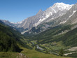 Alpy, Włochy, Tour du Mont Blanc - wzdłuż  masywu Mont de la Saxe, widok z rzeką w dolinie