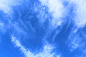 Beautiful blue sky and white cirrus clouds. Landscape. Background.