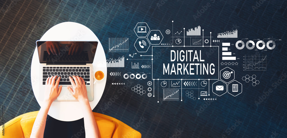 Digital Marketing with person using a laptop on a white table - obrazy, fototapety, plakaty 