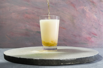 Poster - Glass of beer on a dark-red background