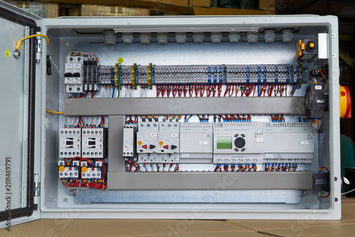 Modern Electrical Control Cabinet With Controller And Circuit