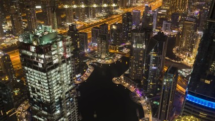 Wall Mural - Night time lapse of modern Dubai marina downtown