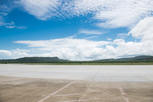 Empty Runway And Cloudy In Sky On Summer