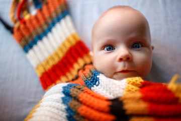 Wall Mural - Baby wrapped in shawl at pediatric examination