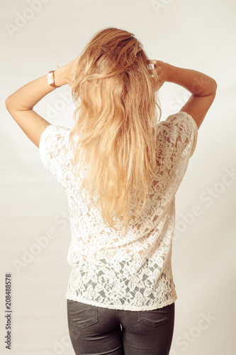 Portrait Of Beautiful Middle Age Blond Woman With Long Dyed Hair