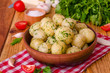 Boiled young potatoes with butter, dill and garlic