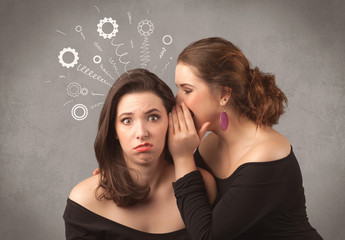 Wall Mural - Two girlfriends in elegant black dress sharing secrets with each other concept with drawn rack cog wheels and spiral lines on the wall background.