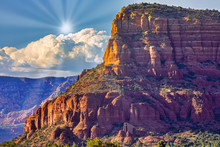 Some Late Afternoon Sun Rays Behind The Chapel Of The Holy Cross In Sedona Arizona.