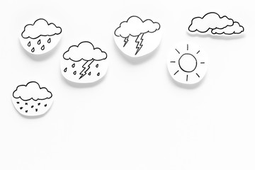 Wall Mural - modern weather icons set on white background top view copy space