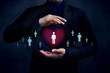 © blacksalmon - Customer Care Concept. Company Protect and Support thire Clients with Mind, Human icon on Heart shape inside a Protected Hands of Businessman