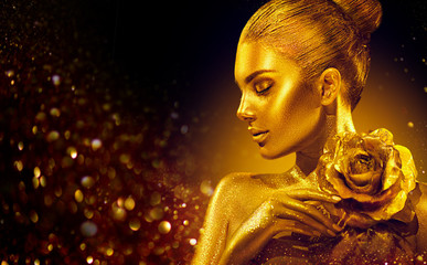 Wall Mural - golden skin woman with rose. fashion art portrait. model girl with holiday golden glamour shiny prof