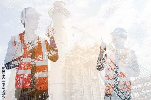 Fotografie, Obraz Double exposure engineering hand holding portable radio and process flow diagram