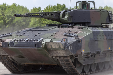 German infantry fighting vehicle drives on a street