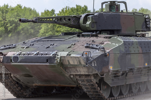 Cuadros en Lienzo German infantry fighting vehicle drives on a street