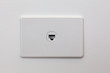 © Greg Brave - Network connection wall outlet on white wall with copy space