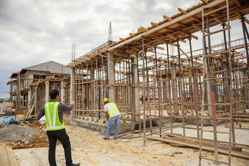 Asian business man construction engineer worker at building site