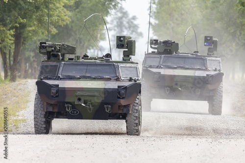 Fototapeta German light armoured  reconnaissance vehicle drives on a road
