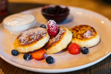 Wall Mural - Breakfast with cottage cheese pancakes