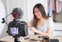 Asian Young Female Blogger Recording Vlog Video With Makeup Cosmetic At Home Online Influencer On Social Media Concept.live Streaming Viral.