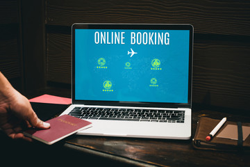 Poster - traveler use passport data to online booking for hotel,airplane ticket for holiday vacation on laptop at home,Digital technology lifestyle.