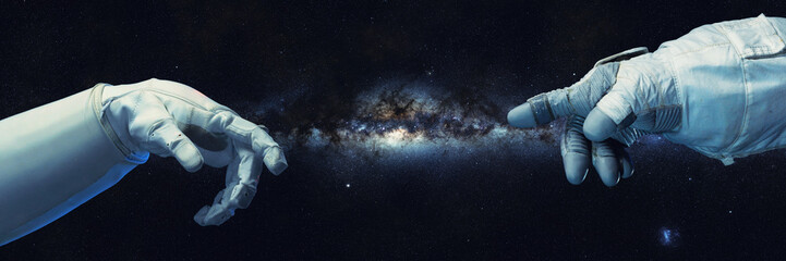 astronaut hands in outer space, spacesuit gloves with the milky way galaxy
