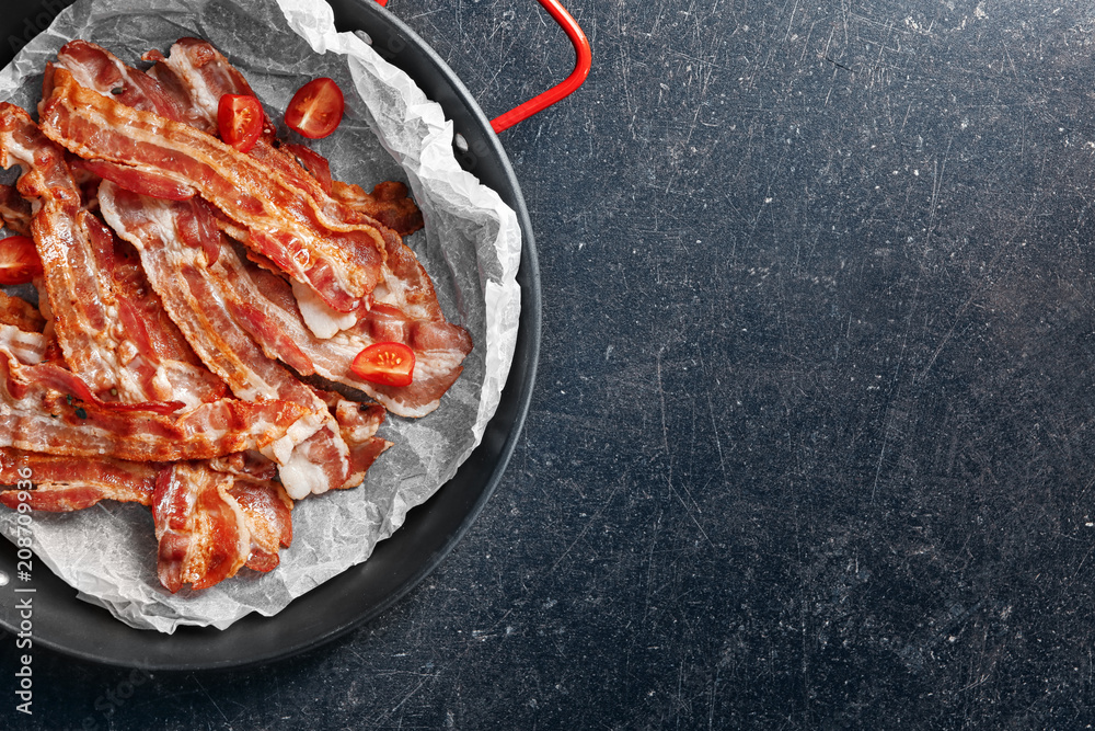 Dish with tasty bacon on grey background - obrazy, fototapety, plakaty 