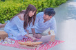 © May Chanikran - Young Asian couple spending time together and planing his future life.