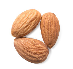 Tasty almond nuts on white background