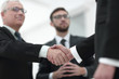 © ASDF - closeup handshake proven business partners