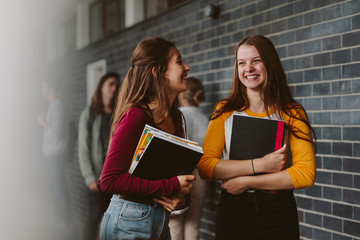 Wall Mural - Female college students after lecture